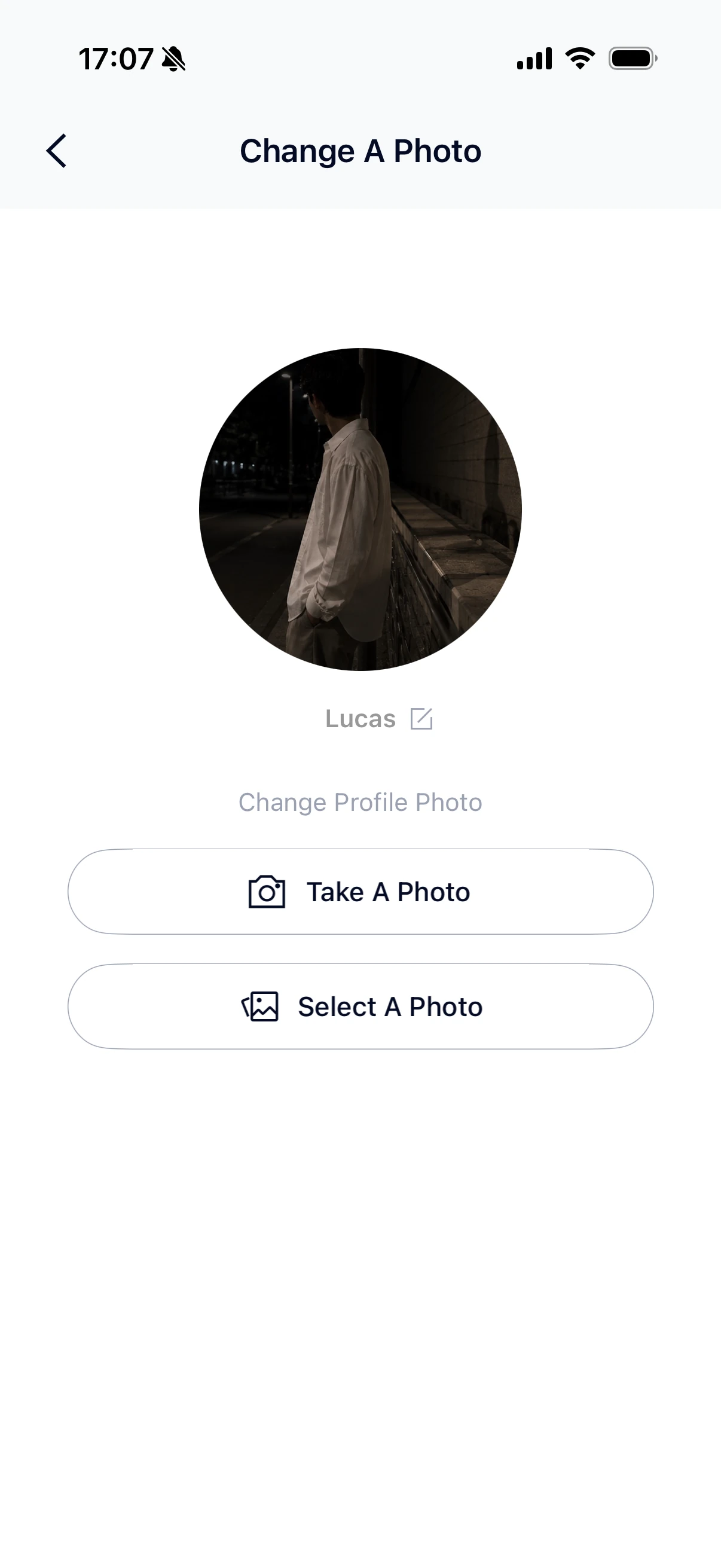 Profile editor showing the nickname edit icon, Take A Photo and Select A Photo.
