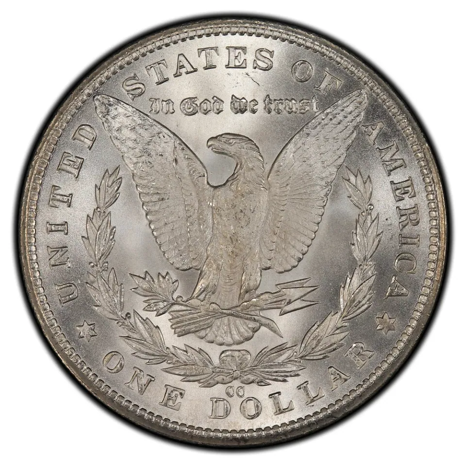 Same coin · reverse: The CC mark sits below the wreath and above ONE DOLLAR.