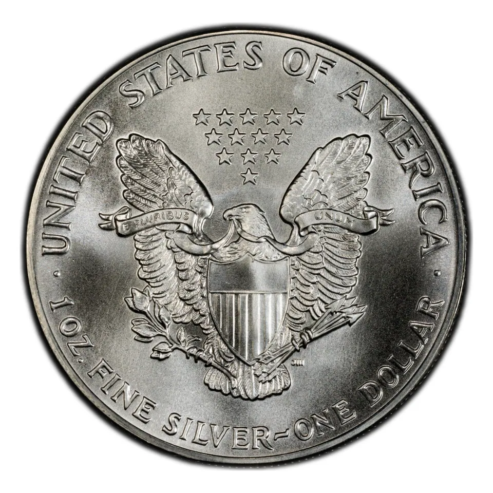 Same bullion coin reverse: Mercanti’s heraldic eagle, one-ounce silver inscription and no mint mark.