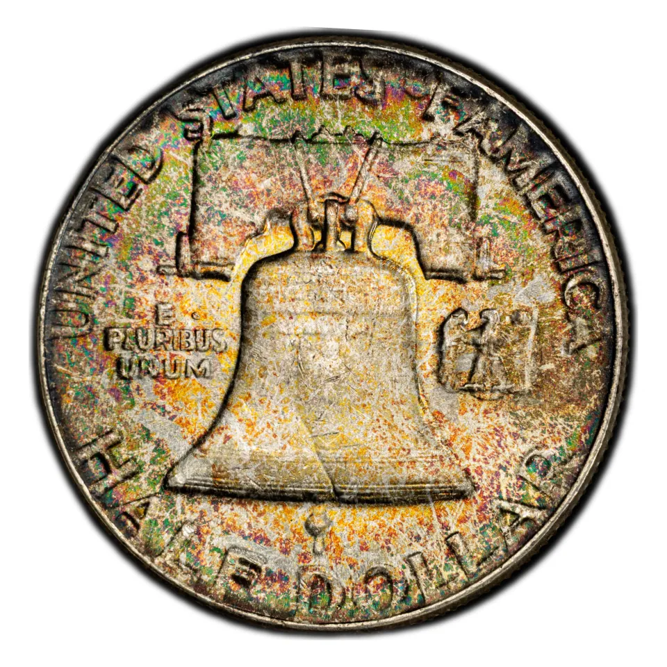 Same 1954 Liberty Bell reverse: inspect above the bell for a mint letter.